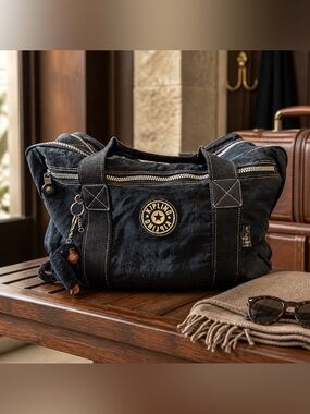 Kipling Navy Canvas Duffel Bag with Monkey Charm